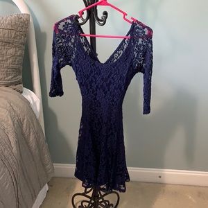 Navy lace dress with crossed, open back
